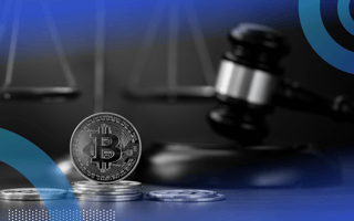 Legal gavel and bitcoin with scales in the background
