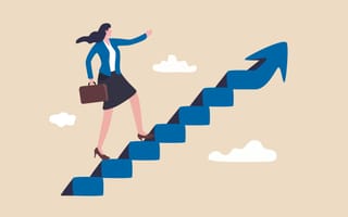 An illustration of a businesswoman climbing a staircase shaped like a pointed arrow into the sky, symbolizing the idea of women achieving professional success