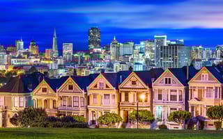 San Francisco, California, USA cityscape and square at night.