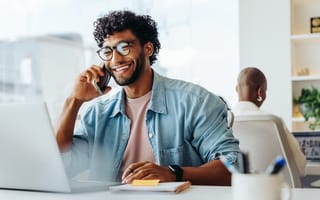 Kustomer Secures $30M Series B to Fuel AI Investments Person talking on phone.