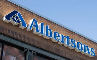 Brick exterior with a large, blue "Albertsons" sign.
