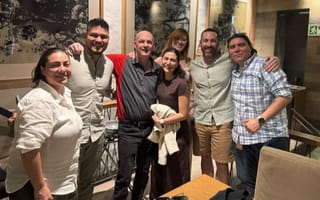Chris Rustici and several teammates pose for a group photo during a team outing