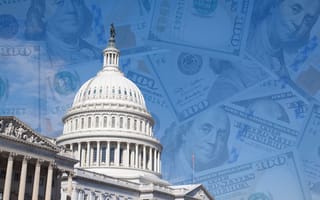 The Capitol building with dollar bills superimposed on a light-blue sky in the background.