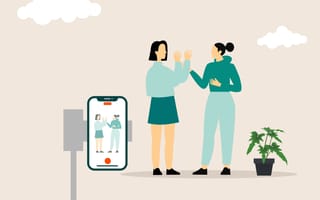 An illustration of two individuals recording a video on a mobile phone