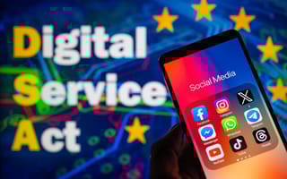 Trump Is Railing Against the EU’s Digital Services Act. U.S. and Tech Giants Are Caught in the Middle. Image of a phone with apps displayed, along with the words "Digital Service Act" overlayed on a blue background with golden stars.