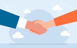 An illustration of two hands, which belong to a businesswoman and a businessman, in a handshake, representing the idea of closing a sales deal