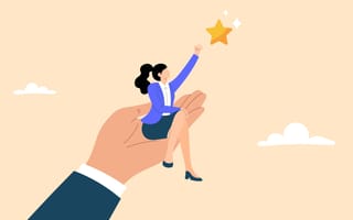 An illustration of a giant hand holding a businesswoman as she reaches for a gold star in the sky, symbolizing the idea of helping employees succeed