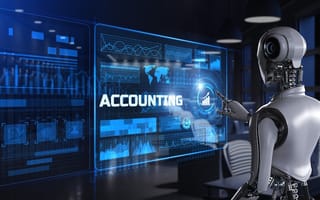 A robot stands in front of a digital screen featuring the word ACCOUNTING.