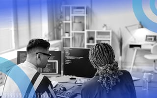 Two developers doing a coding interview evaluation
