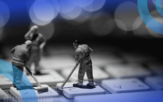 Effective AI Use Starts With This Key Practice Tiny workers clean a keyboard