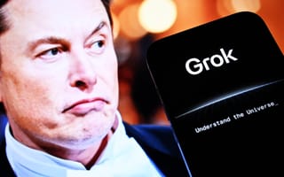 Elon Musk is pictured next to a smartphone displaying the Grok app.