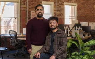 Reducto’s co-founders, CTO Raunak Chowdhuri and CEO Adit Abraham are pictured next to each other in an office setting.