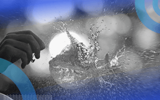 A pin popping a bubble