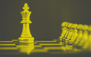 5 Ways CMOs Can Quickly Show Their Value King chess piece standing in front of a line of pawns.
