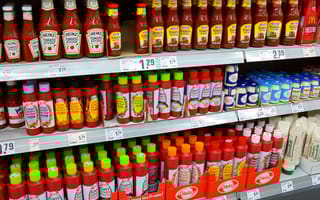A photo of Heinz tomato ketchup bottles.