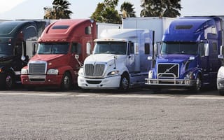 Trucks parked in a parking lot.