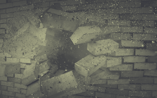 Brick wall being demolished.