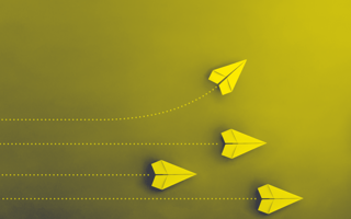 3 paper planes moving straight, 1 veers upwards for business growth concept.