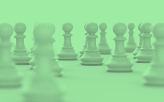 Closeup of a multiple pawns of the same color.