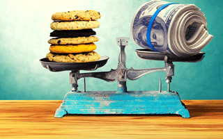 cookies and cash on scale