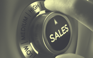 A dial that says sales in the center.