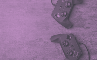 Two gaming console remotes.