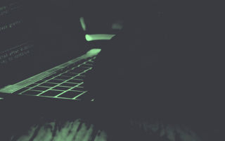 To Stop Future Hacks, Look to the Past A computer hacker works on a laptop