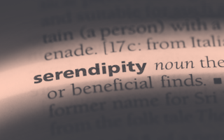 A close-up of the dictionary entry for the word "serendipity"