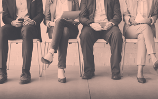 A group of job applicants await interview