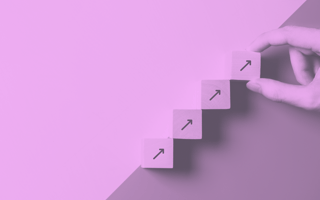 Person placing blocks with arrows going upwards.