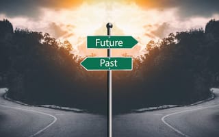 Sign post with "future" and "past." Interview prompt tell me about yourself