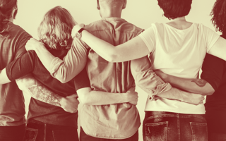 group of people embracing each other