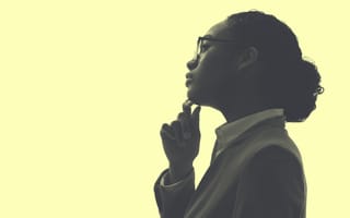 Silhouette of person thinking.