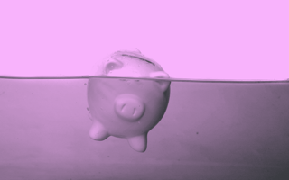 Piggy bank sinking in water.