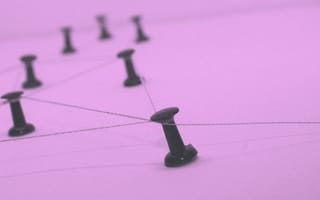 Pins connected by string.