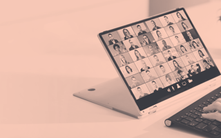 A tablet screen with many people conferencing in.