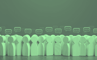 A crowd of wooden pegs with speech bubbles over them.