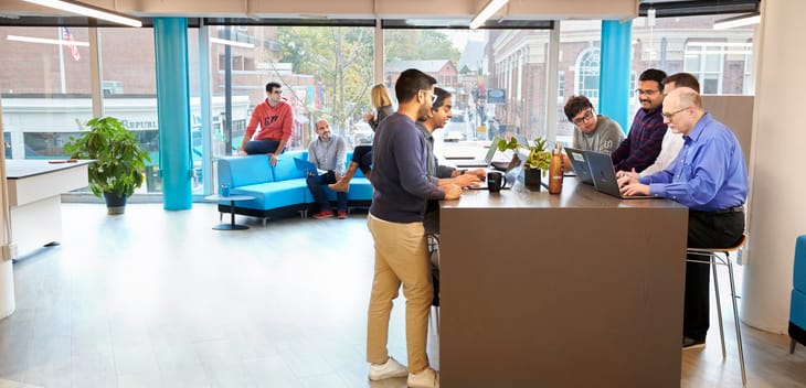 A group of Kensho employees work in their Cambridge, MA, headquarters