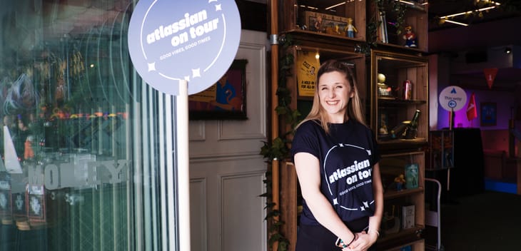 An Atlassian team member at an "Atlassian On Tour" event