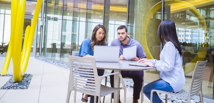 Liberty Mutual colleagues having a meeting outside at the office