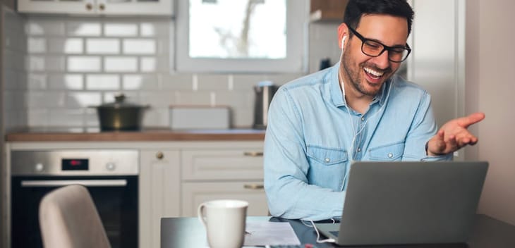 man on a work video call from home
