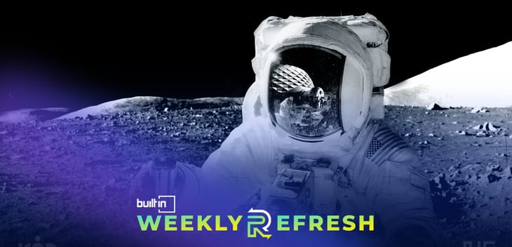 An astronaut on the moon with ICON’s structure in the masks reflection.