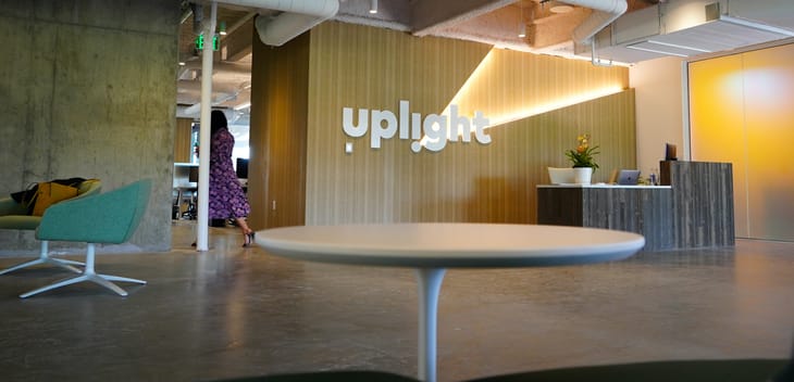 photo of uplight's office lobby with tables and chairs