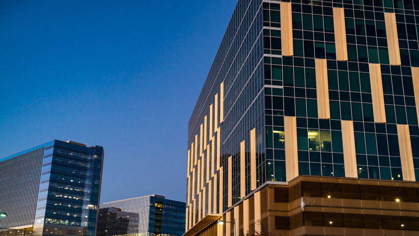 New High Tech North Austin District with rising Glass towers and office buildings at blue hours with lights illuminated and Night city lights Austin Texas USA