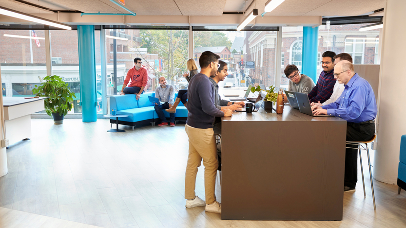 A group of Kensho employees work in their Cambridge, MA, headquarters
