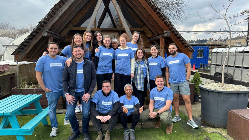 A-group-of-15-SailPoint-team-members-in-company-branded-T-shirts-that-read-%E2%80%9CSailPointCares.%E2%80%9D.jpg
