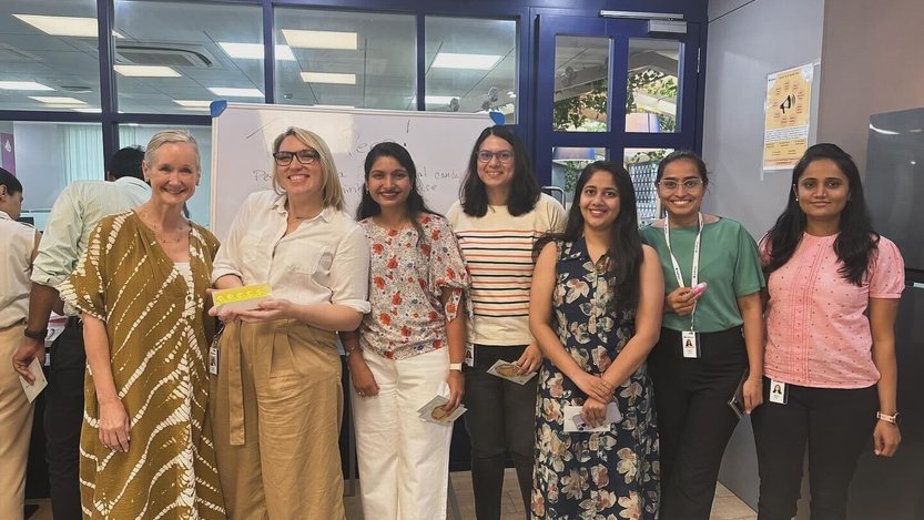 Seven-SailPoint-women-team-members-pose-for-a-photo-in-their-office..jpg