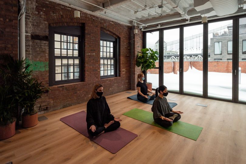 rent the runway coworkers doing yoga