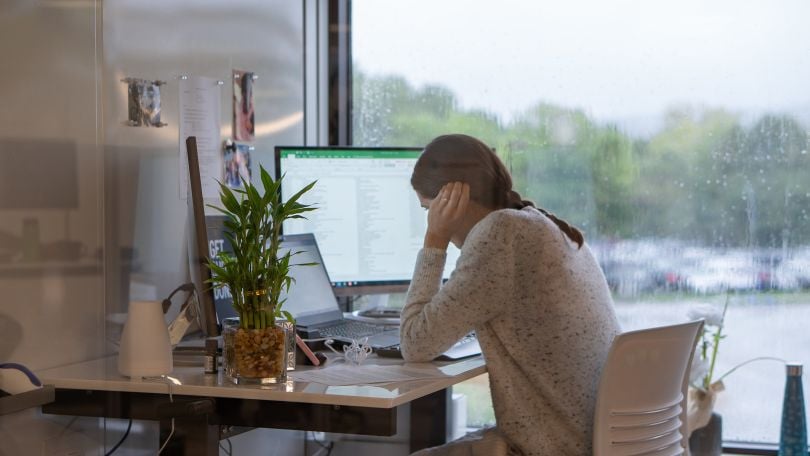 An employee of The Predictive Index focused on work. 