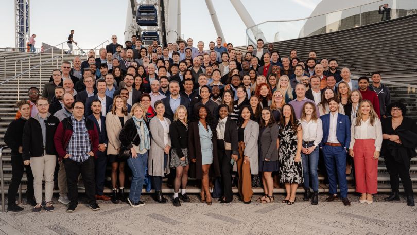 The Analytics8 team assembles for a company photo. 